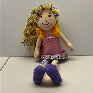 Colorful Groovy Girls Doll with Floral Dress. NORA
